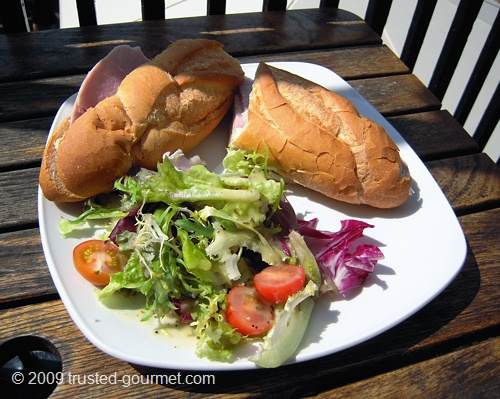 French bread baguette with honey roast ham & wholegrain mustard